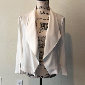 White blazer with zippers on cuffs
